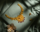 916 Hallmarked Gold Antique Lakshmi Temple Necklace with Ruby and Emerald Stones