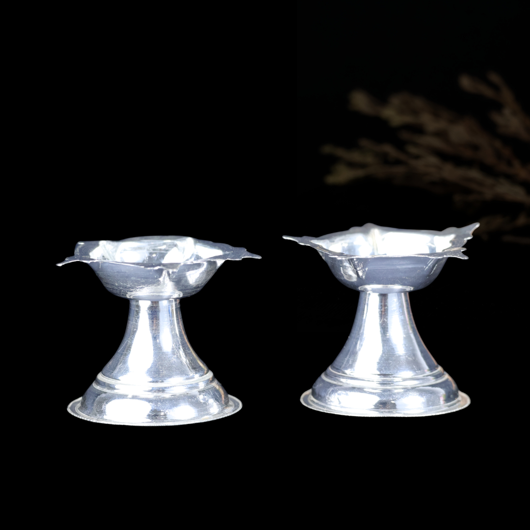 Decorative Diya Pair with detailed silver-colour design