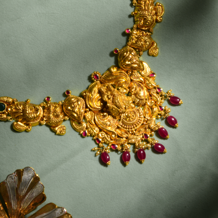 Lakshmi temple necklace pendant with ruby red stone detailing